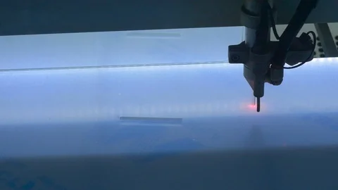 Social distancing. Laser machine cutting plexiglas Stock-Footage 129573346