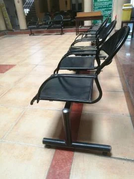 Social distancing made through making vaccant seat between two consecutive se Stock Photos