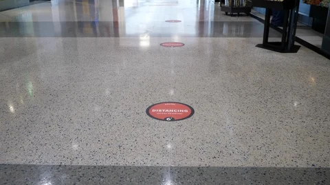 Social distancing markers on the floor Stock Footage 129259627