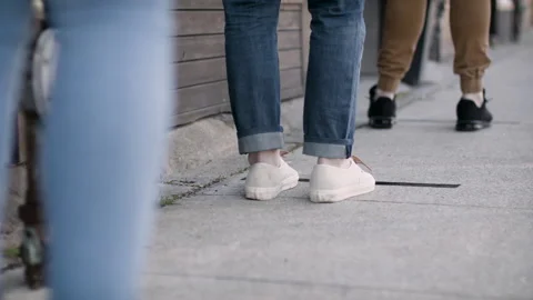 Social distancing. Waiting in a line to enter store during pandemic. Stock Footage 130862276