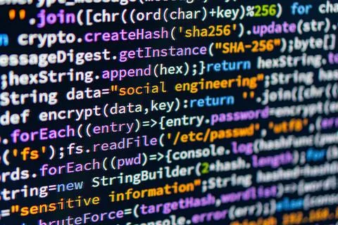 Social engineering. A close-up view of C code involved in cryptographic dat.. Foto stock