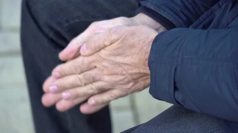 Social Issues Concept. Hands of a senior citizen close up Stock Footage 147322029
