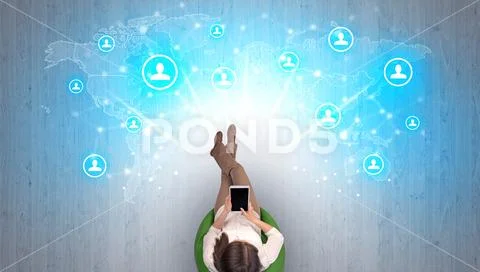 Social media concept with women sitting on chair Stock Photos