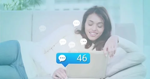 Social media creator watching each chat bubble count rising on screen and Stock Footage 327004525