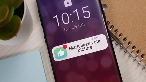 Social Media Like Notification on a Smartphone Screen Stock Footage 122014361
