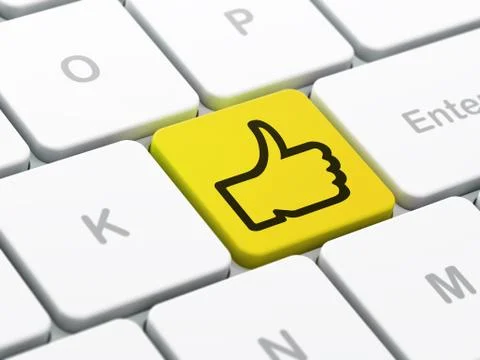 Social network concept: Thumb Up on computer keyboard background Illustrazione stock