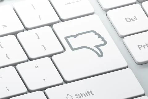 Social network concept: Thumb Down on computer keyboard background Illustrazione stock