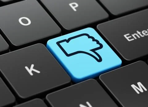 Social network concept: Thumb Down on computer keyboard background Illustrazione stock