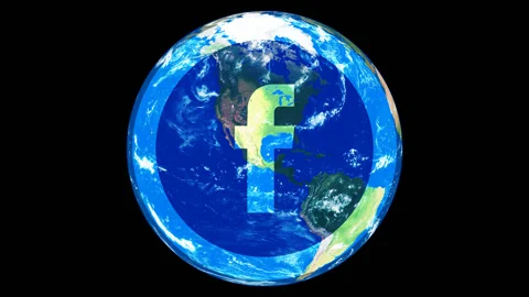 The social network Facebook against the background of the Earth. Stock-Footage 92929037