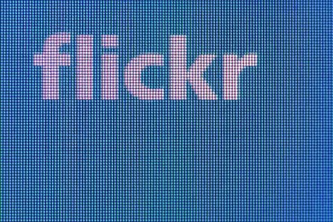 Social network flickr icon on the computer screen Stock Photos