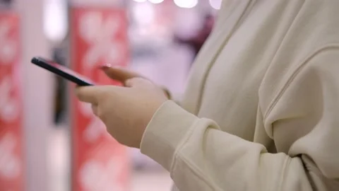 Social network. Flying the camera around. Red discounts. sale of goods.Girl Stock Footage 169574758