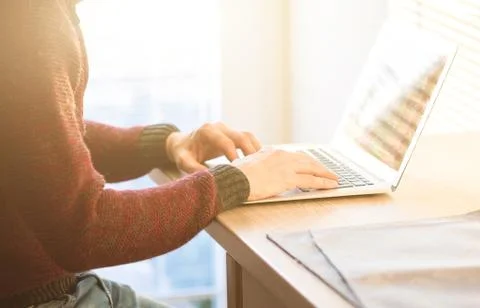 Social network user man working from home using notebook computer, selective  Stock Photos