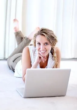 Social networking is so easy these days. Portrait of a pretty young woman Stock Photos
