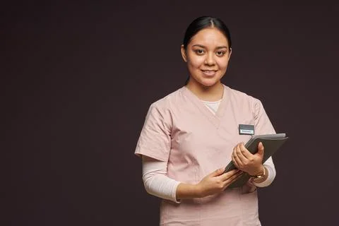 Social worker in uniform with folder Stock Photos