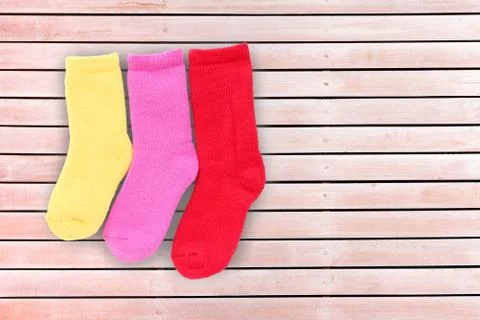 Sock on wood background Stock Photos
