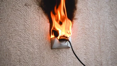 The socket and plug of the electric wire light up. Stock Footage 142955061
