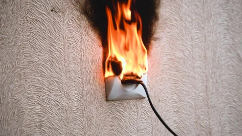 The socket and plug of the electric wire light up. Stock Footage 143450948