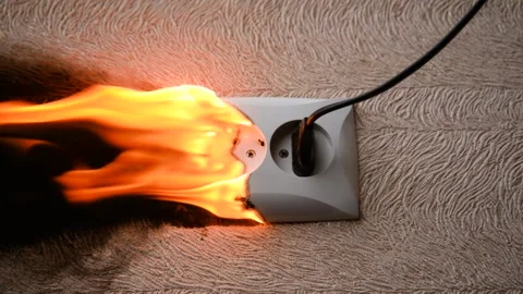 The socket and plug of the electric wire light up. Stock Footage 145936170