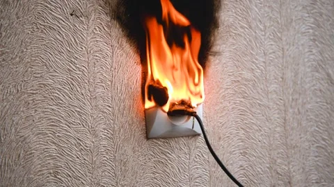 The socket and plug of the electric wire light up. Stock Footage 152398017