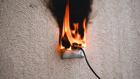 The socket and plug of the electric wire light up. Stock Footage 155530931
