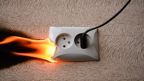 The socket and plug of the electric wire light up. Stock Footage 155531071