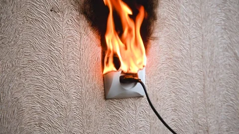 The socket and plug of the electric wire light up. Stock Footage 156049280