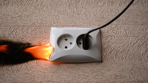 The socket and plug of the electric wire light up. Stock Footage 156838622