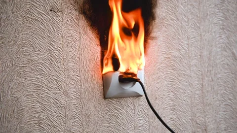 The socket and plug of the electric wire light up. Stock Footage 159235380