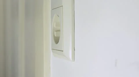 Socket and plug, seen from the side Stock Footage 12096437