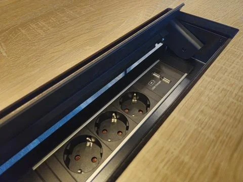 Socket built into desk Stock Photos