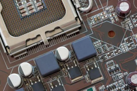 Socket electronics components on PC computer mainboard. Stock Photos
