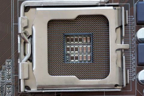 Socket electronics components on PC computer mainboard. Stock Photos