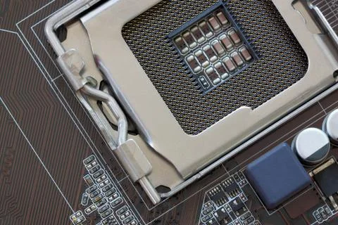 Socket electronics components on PC computer mainboard. Stock Photos