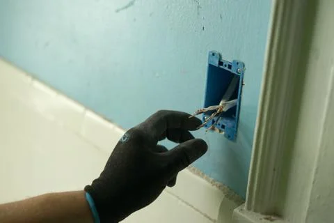 Socket plug installation. Stock Photos