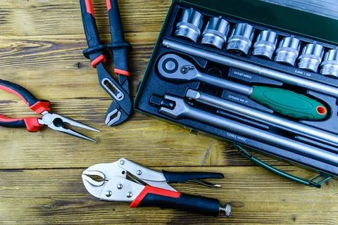 Socket set with socket wrench, adjustable water pump pliers Stock Photos