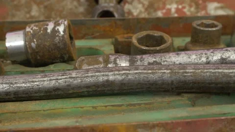 Socket sleeve heads, tools for loosening and tightening nuts. Old wrenches co Stock Footage 218578633