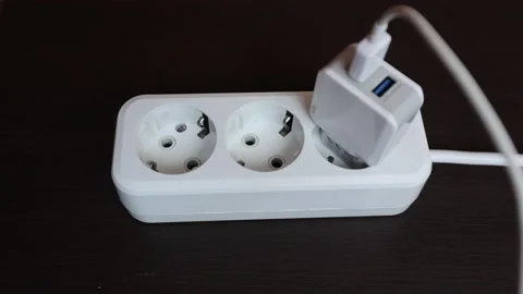 Socket with three connectors for equipment. The carrier is white Stock Footage 230681848