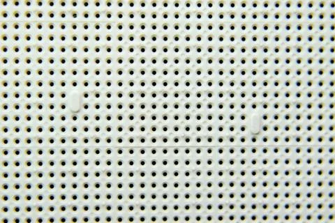 A socket under the processor of the computer, holes under the feet of the con 写真素材