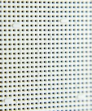 A socket under the processor of the computer, holes under the feet of the con 写真素材