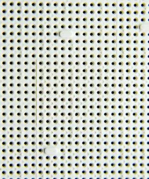 A socket under the processor of the computer, holes under the feet of the con 库存照片