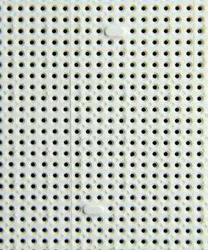 A socket under the processor of the computer, holes under the feet of the con Stock Photos