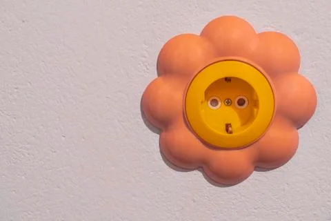 Socket on the wall of the children's room Stock Photos