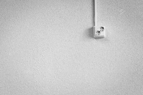 Socket on a white wall Stock Photos