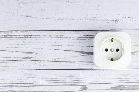 Socket on the wooden wall Stock Photos