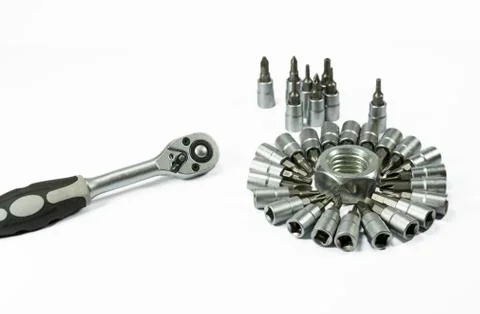 Socket wrench with bits and nut Stock Photos