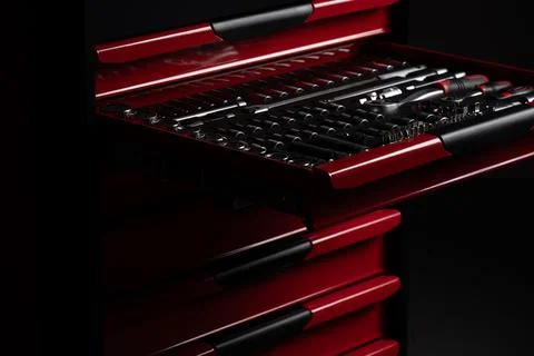 Socket wrench set organized in red mechanic tool chest drawer Stock Photos
