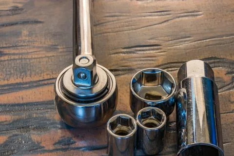 Sockets and a socket wrench Stock-Fotos