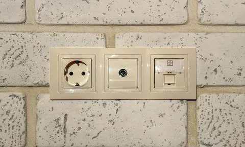 Sockets in the wall Stock Photos