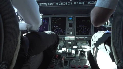 Сockpit view of airline pilot control aircraft in daytime Stock Footage 105668850