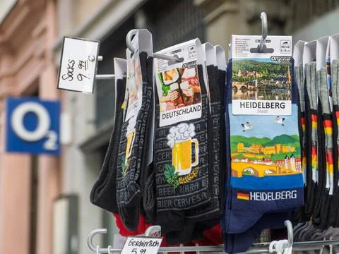 Socks Displayed on Rack Featuring Destinations and Designs Photos